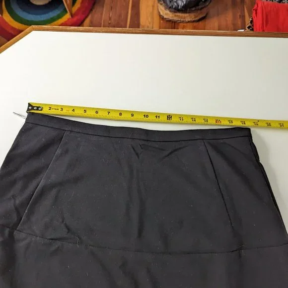 Michael Kors Black Mini Skirt with Silver Grommet Border - Picture 5 of 7